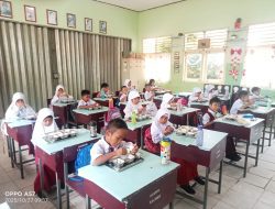 Koramil 01/Kota Kawal Distribusi Makanan Bergizi untuk Pelajar di Tanjungpinang