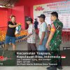 Babinsa Koramil 02/Bintim Pantau Pembagian Beras Sosial di Desa Toapaya